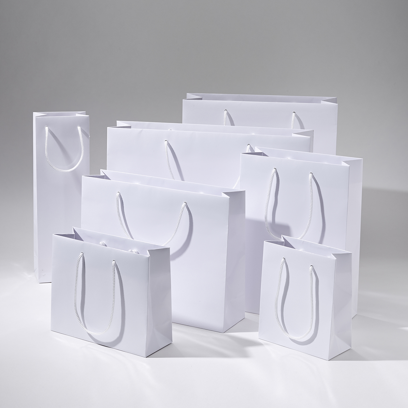 12x8x38 torba papierowa biała premium laminowana błyszcząca, bez nadruku CCL_white_36x12x40_noprint